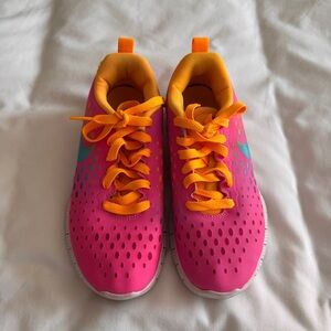Nike Kids Pink Sneakers with Orange Accents